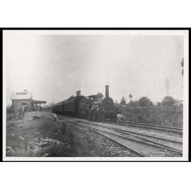 Steam train leaving railway station, Fairfield NSW