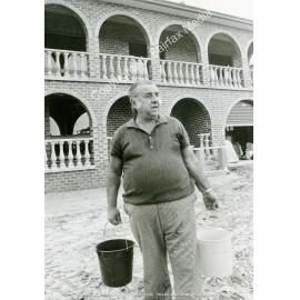 Bossley Park man Joseph Crane with the buckets, Bossley Park, NSW