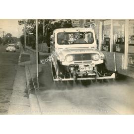 Arthur Lincoln at the wheel of the Footpath Flusher in Cabramatta