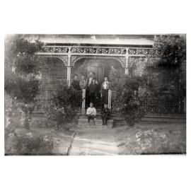 William and Ellen Westacott with family at their front gate
