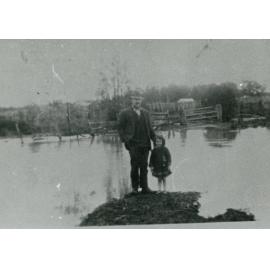 Mr Downey and Nancy in a flood