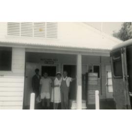 Four people standing outside Kitchen One, Cabramatta Migrant Hostel, Cabramatta, NSW.