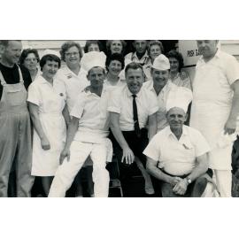 A large group of people standing outside the kitchen, Cabramatta Migrant Hostel, Cabramatta, NSW>