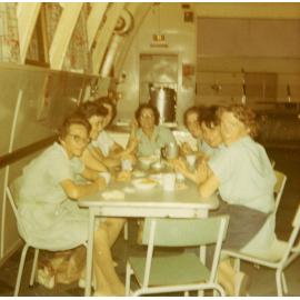 A group sitting around a table, Cabramatta Migrant Hostel, Cabramatta NSW