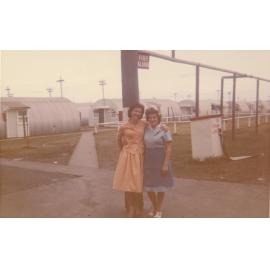 Peggy Pearson and Cathie standing outside, Cabramatta Migrant Hostel, Cabramatta NSW