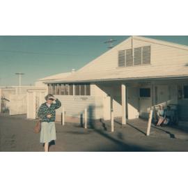 Peggy Pearson standing outside of Kitchen No. 1, Cabramatta Migrant Hostel, Cabramatta NSW