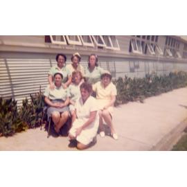 A group of women outside the dining room