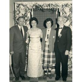 Peggy Pearson wearing a kilt with three others