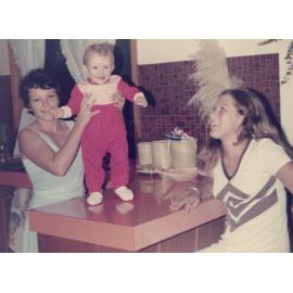 A baby on a table.