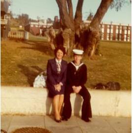 Peggy Pearson and a young man in naval dress.