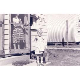 Little girl with a case, Cabramatta Migrant Hostel, Cabramatta NSW