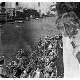 Arab traders selling wares to passengers on the Ship Fairsky, 1959