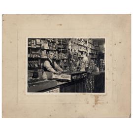 Roy and Reg Wheatley at the Wheatley's store, The Crescent, Fairfield NSW, c. 1930s